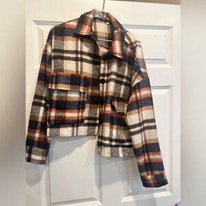 Cute cropped plaid jacket. Never worn, just not my style anymore!